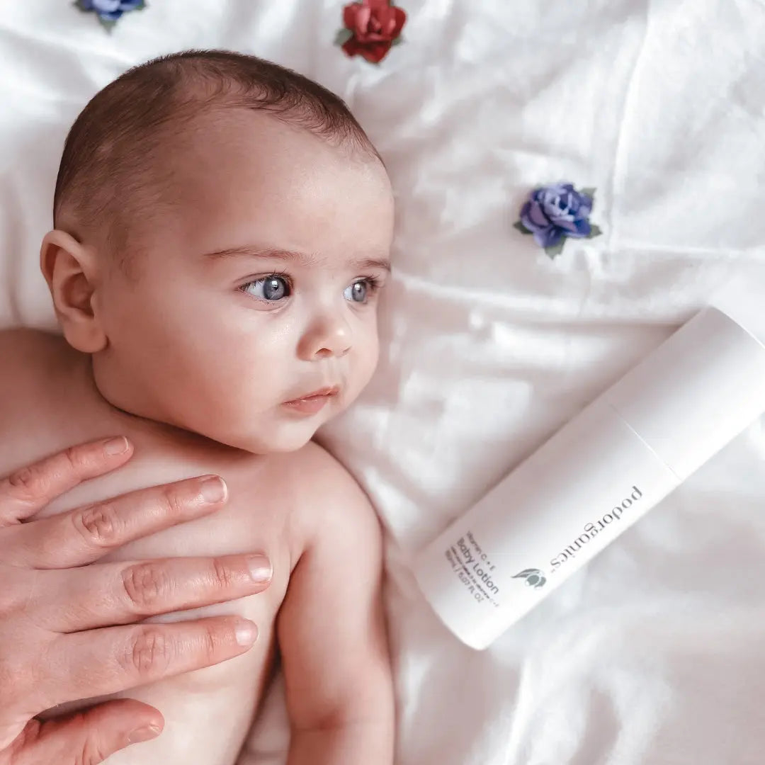 Baby after bath using Pod Organics Baby Lotion to keep skin soft and nourished