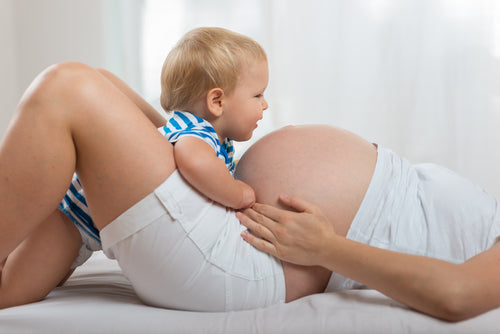 baby and pregnant mother